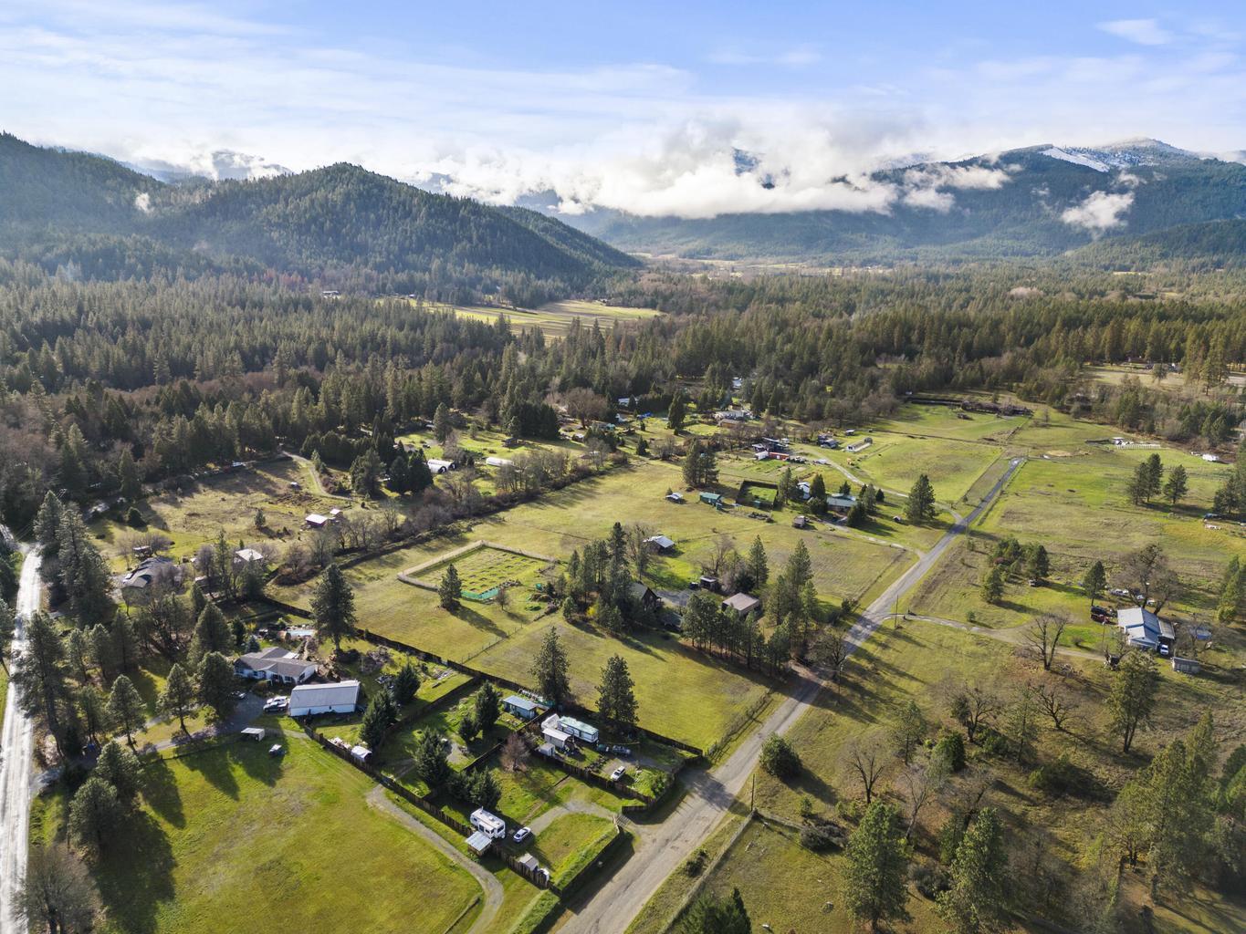 1190 Cedar Flat Road Williams, OR 97544 - Photo 37 of 45 an aerial view of residential houses with outdoor space