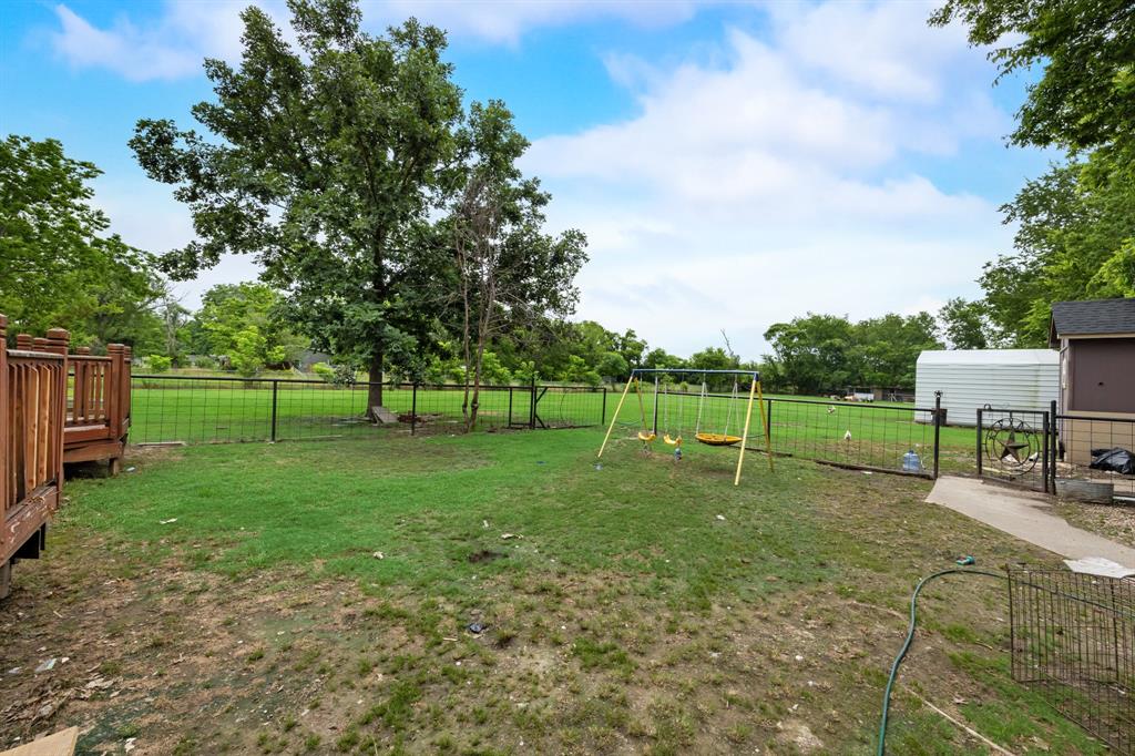 571 South 1st Street Point, TX 75472 - Photo 22 of 27 a view of a park with swings