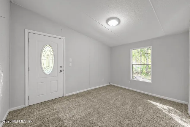 a view of empty room with window