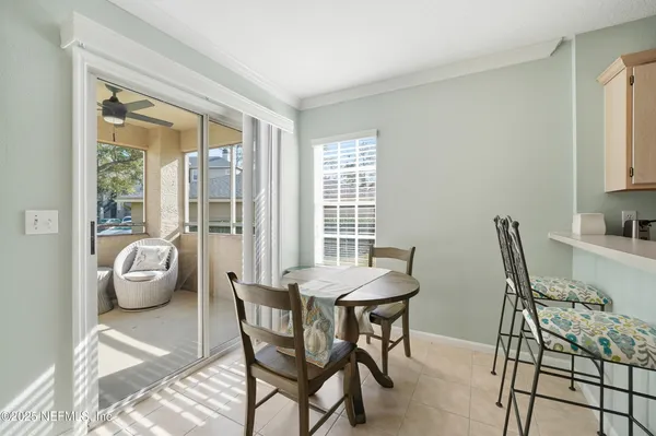 a kitchen with stainless steel appliances a refrigerator stove microwave and cabinets