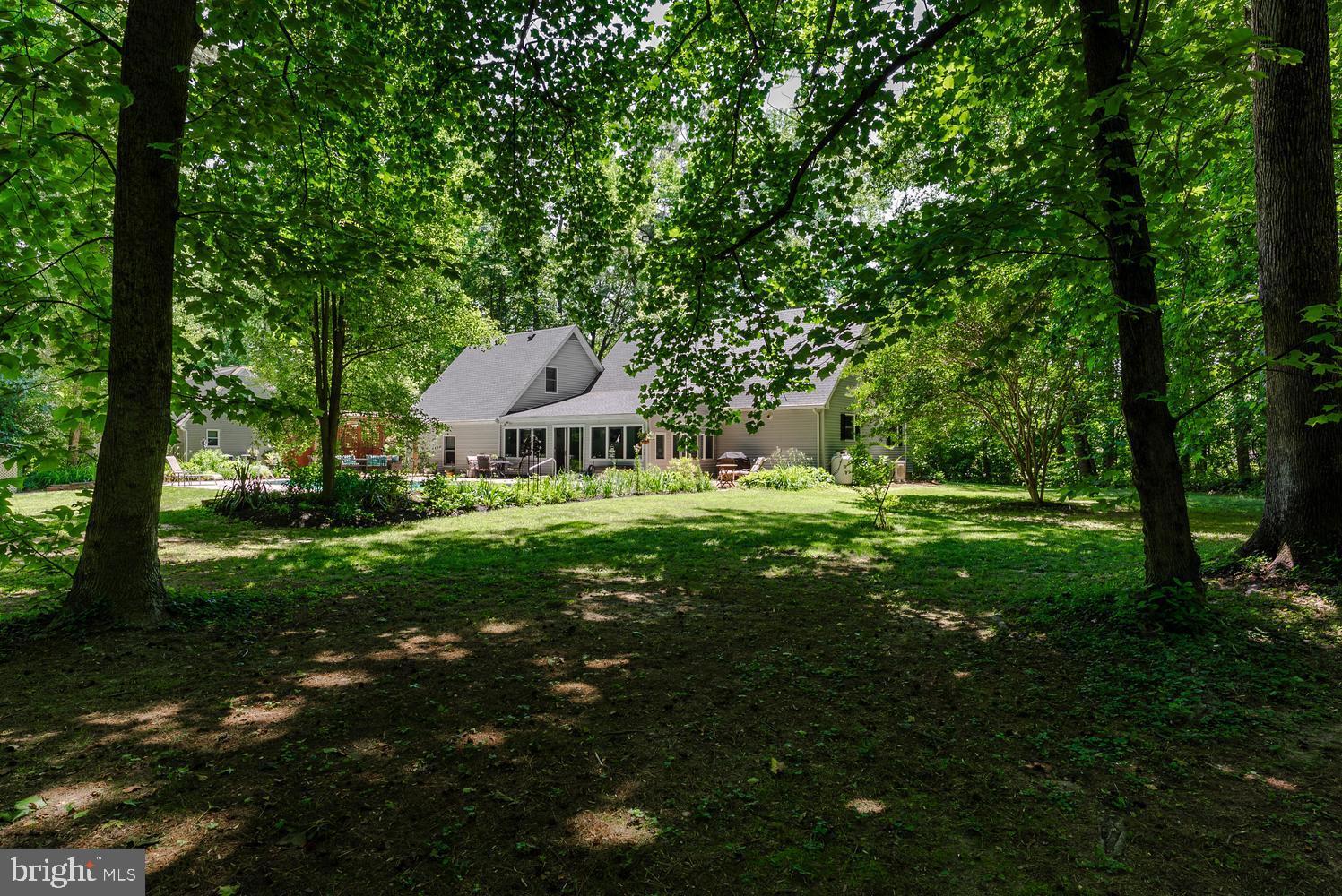 814 Wrights Neck Road Centreville, MD 21617 - Photo 22 of 53 a view of a house with a big yard
