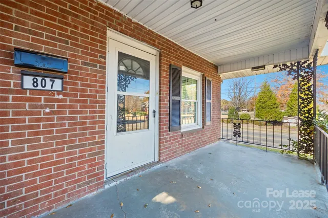 a view of an entryway door front of house