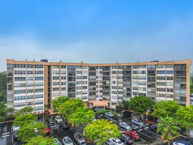 a view of city with tall buildings