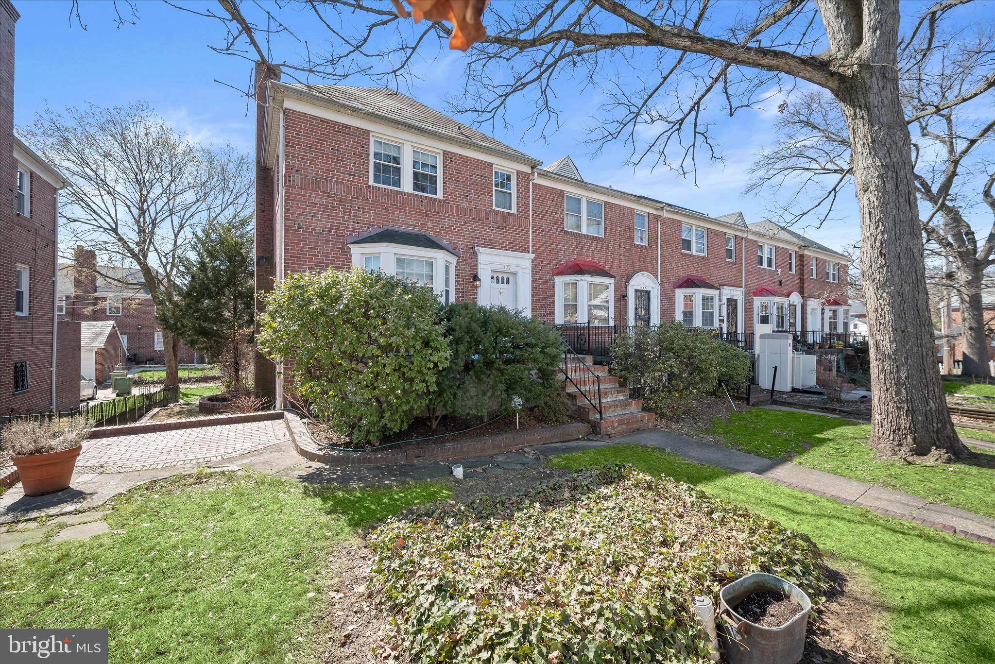 1509 Shadyside Road Baltimore, MD 21218 - Photo 2 of 38 a front view of a house with garden