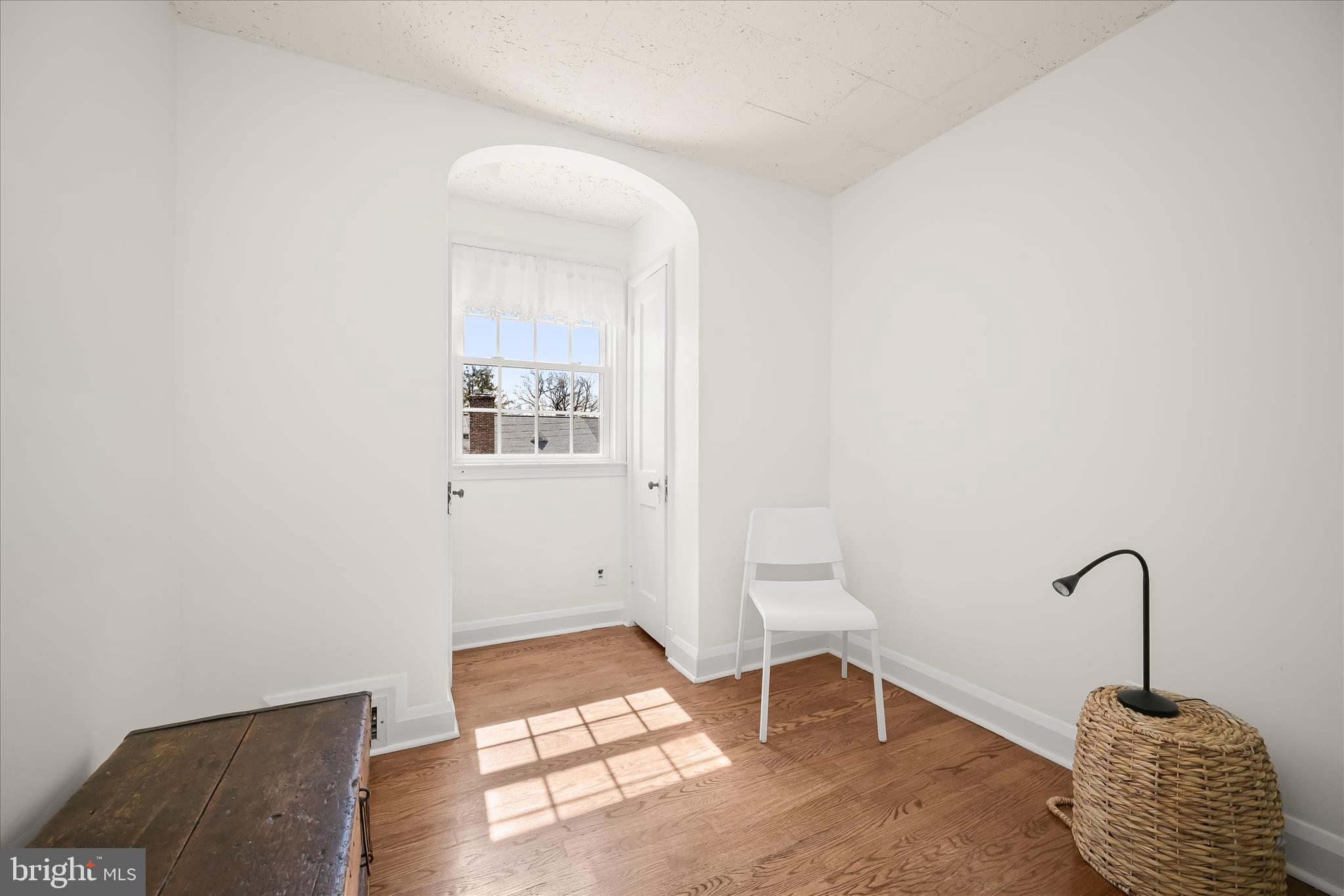 1509 Shadyside Road Baltimore, MD 21218 - Photo 26 of 38 a room with furniture and a window