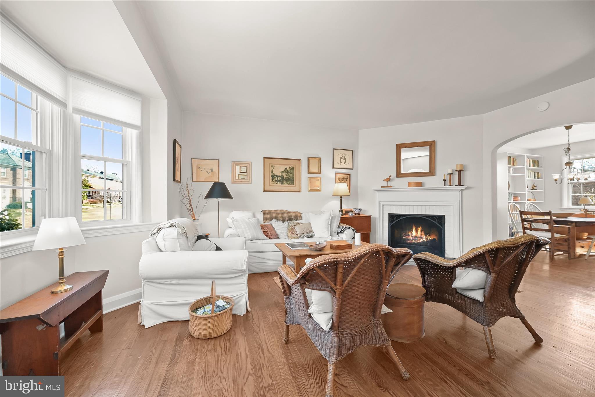 1509 Shadyside Road Baltimore, MD 21218 - Photo 6 of 38 a living room with fireplace furniture and a wooden floor