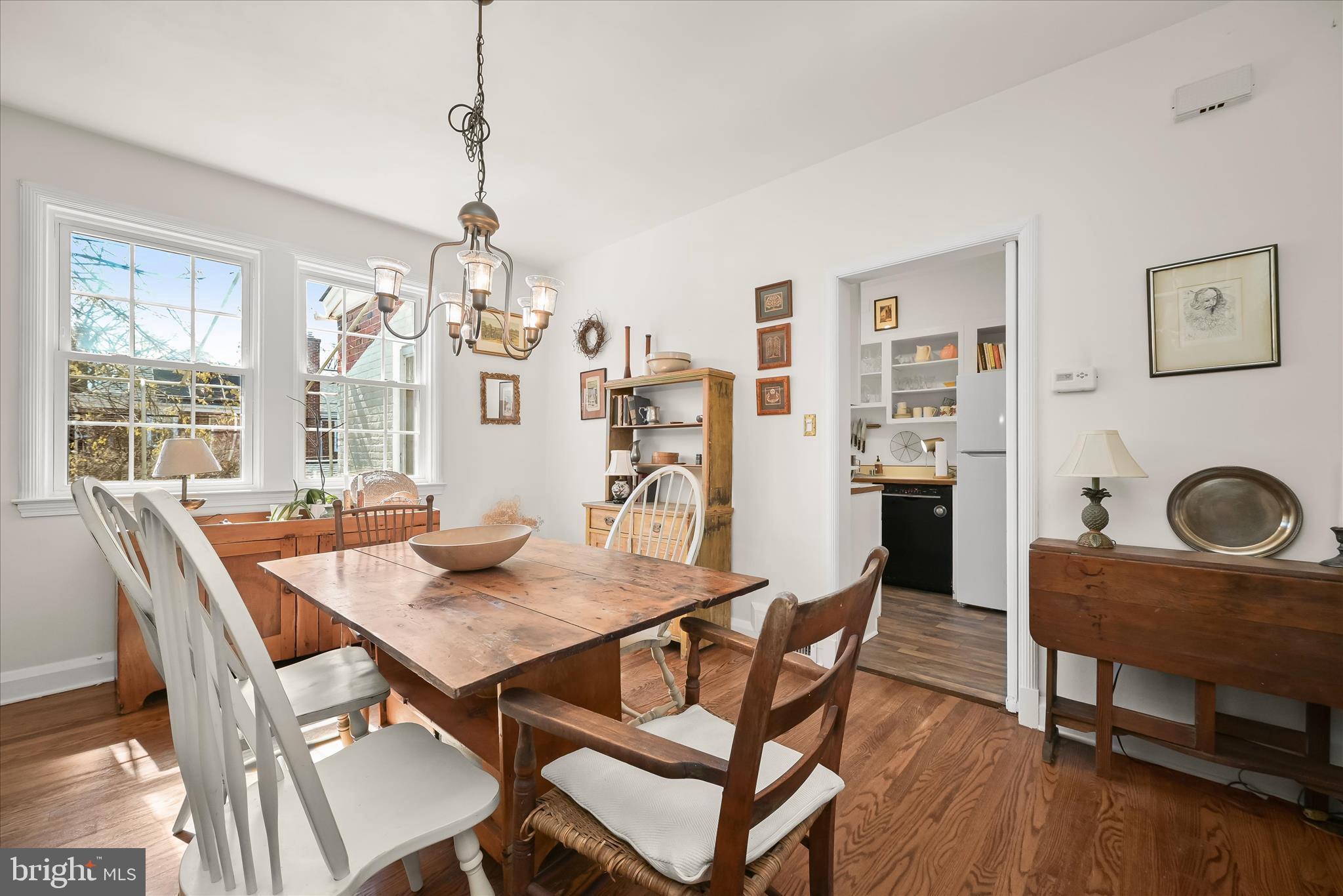 1509 Shadyside Road Baltimore, MD 21218 - Photo 10 of 38 a view of a dining room with furniture window and wooden floor