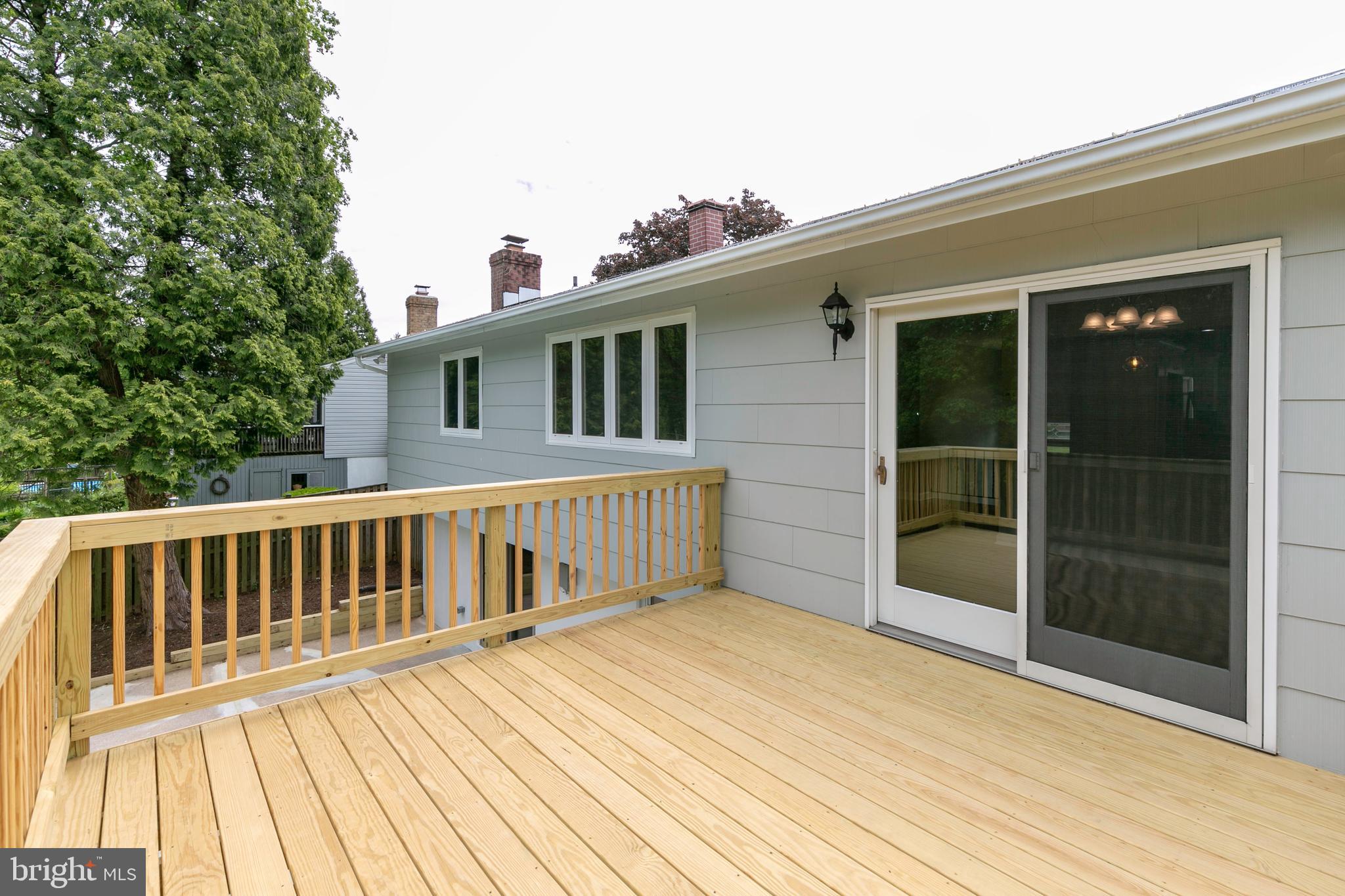 121 Chargeur Road Reisterstown, MD 21136 - Photo 33 of 42 Slider From Dining Area To New Deck