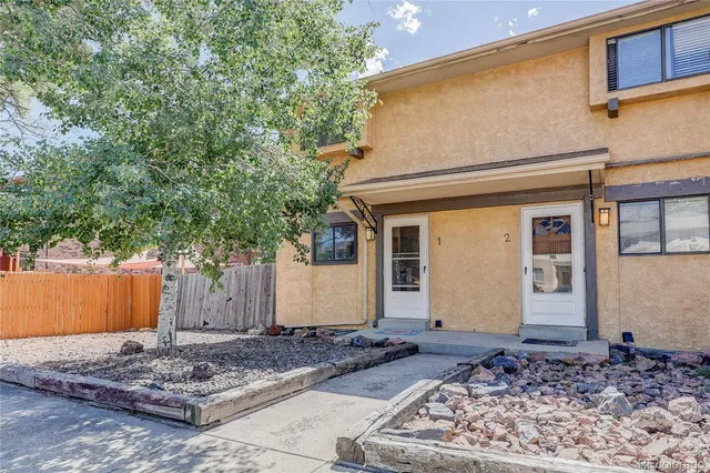 a view of a house with a trees