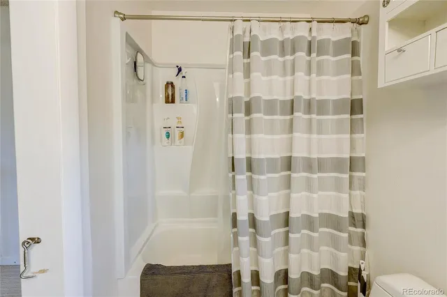 a view of a livingroom with a staircase