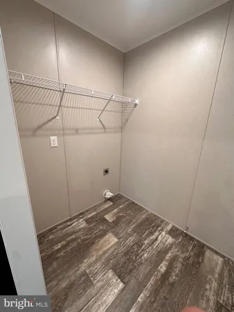 a view of a room with racks on the wall