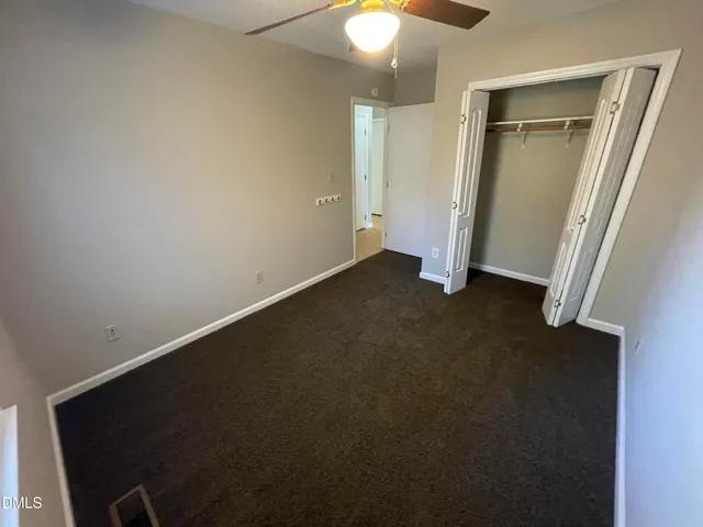 an empty room with a door