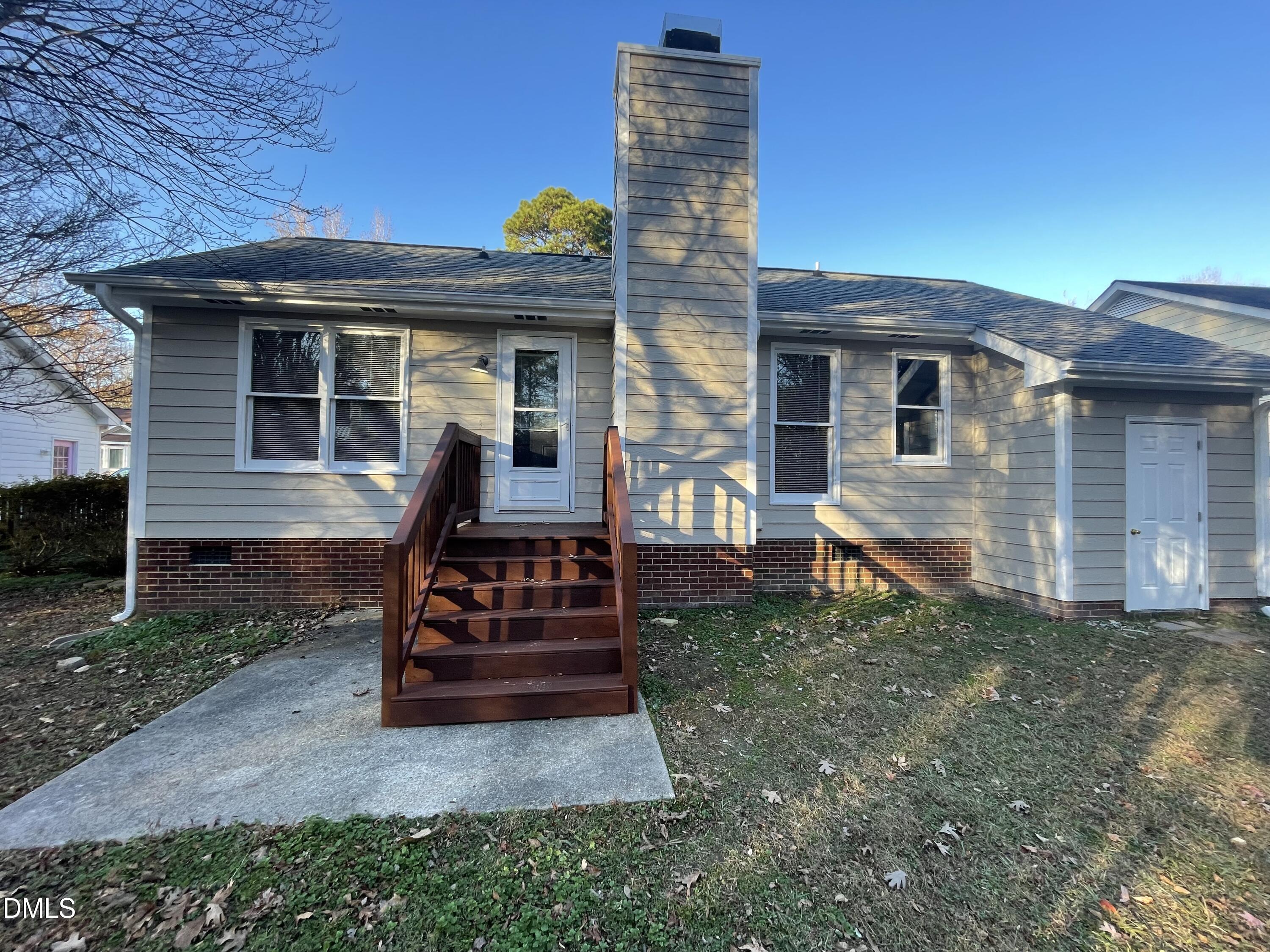 4116 Lodge Allen Court Raleigh, NC 27616 - Photo 5 of 20 a front view of a house with garden