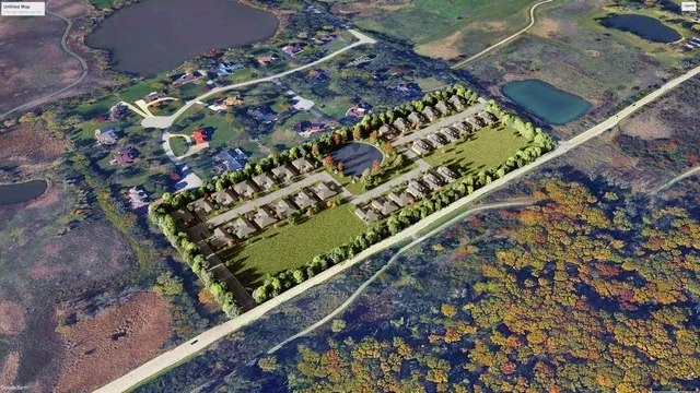 a front view of multiple houses with yard