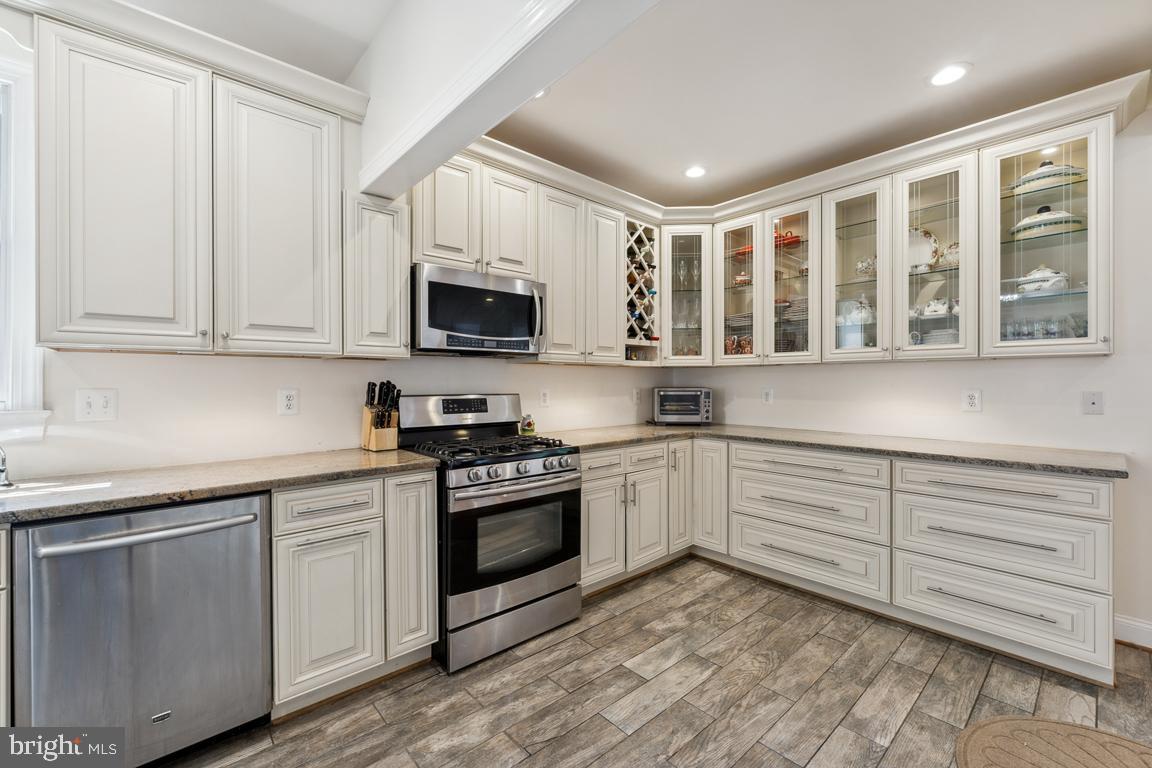 2034 Shirlington Road Arlington, VA 22204 - Photo 6 of 43 Built-in wine rack and display cabinets