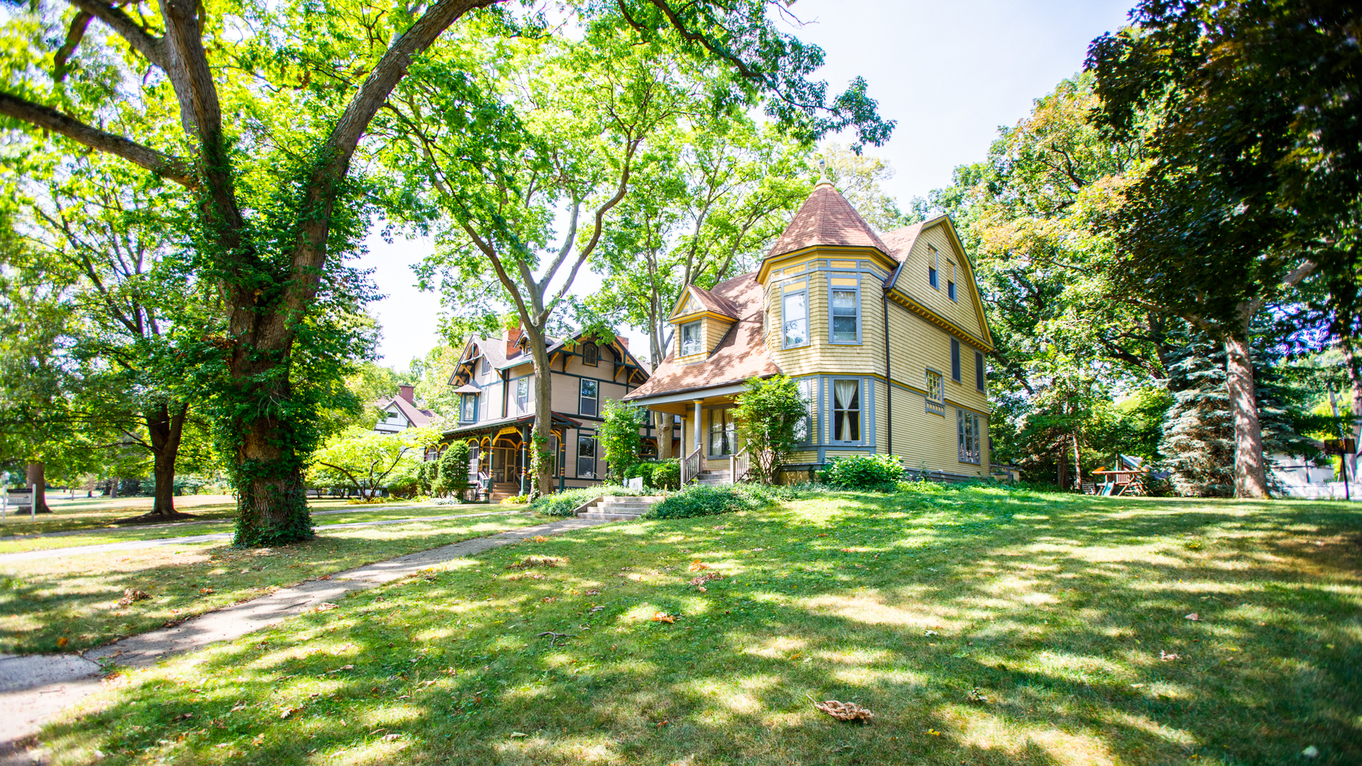 a view of a building with a yard
