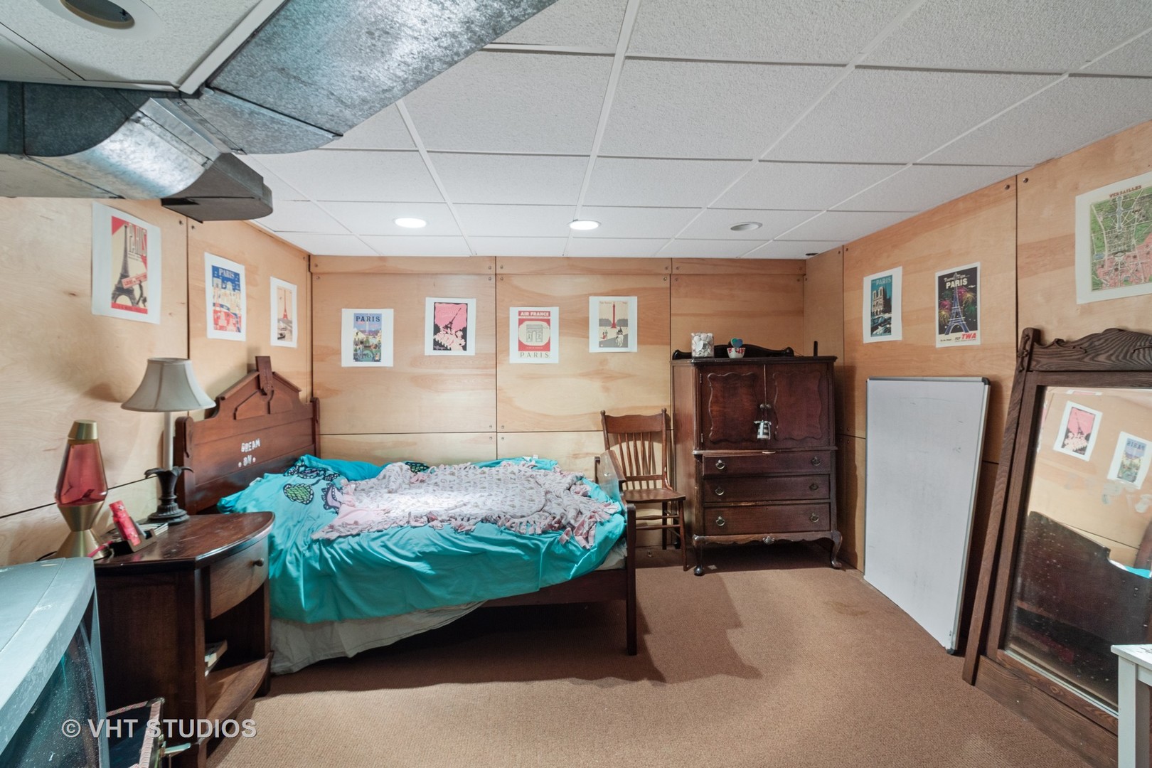 136 Scottswood Road Riverside, IL 60546 - Photo 14 of 20 a bedroom with furniture and a flat screen tv