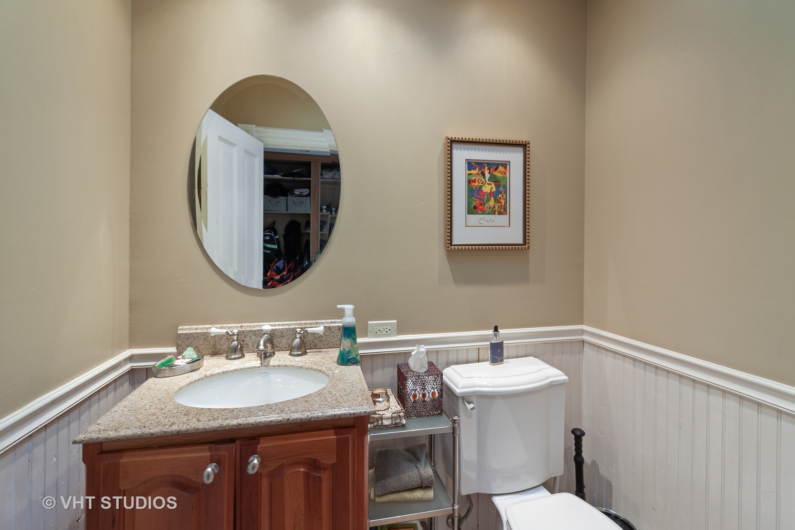 136 Scottswood Road Riverside, IL 60546 - Photo 18 of 20 a bathroom with a sink and a mirror