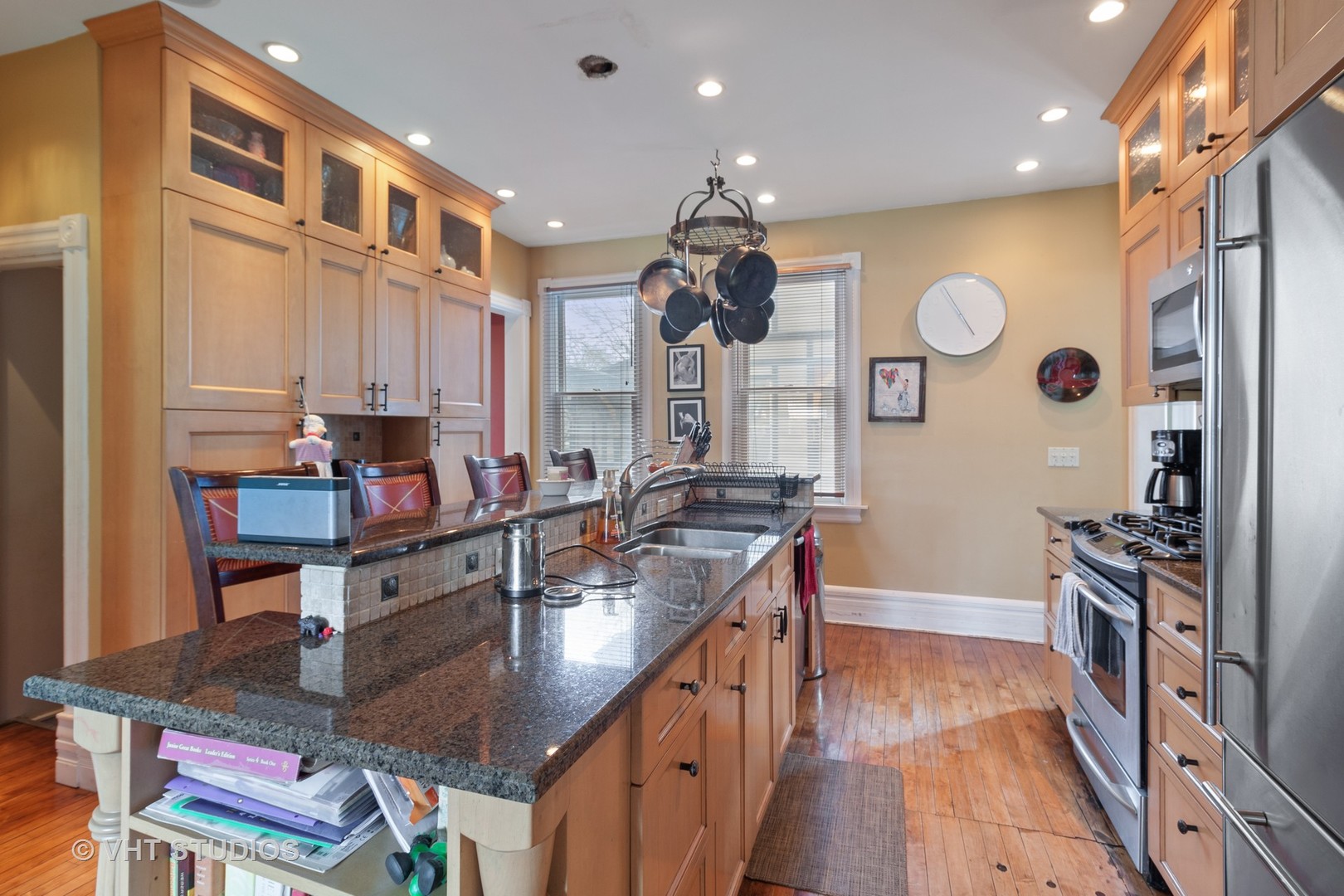 136 Scottswood Road Riverside, IL 60546 - Photo 3 of 20 a kitchen with stainless steel appliances granite countertop a sink and a stove