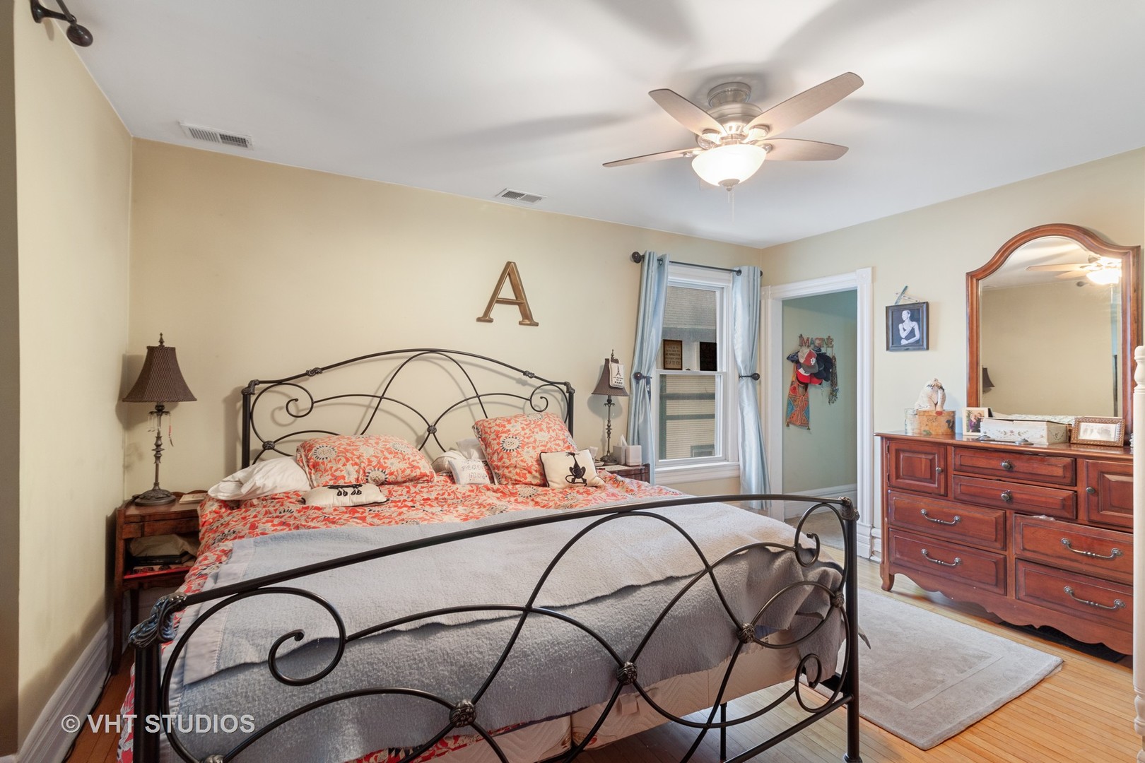 136 Scottswood Road Riverside, IL 60546 - Photo 10 of 20 a bedroom with a bed and a dresser
