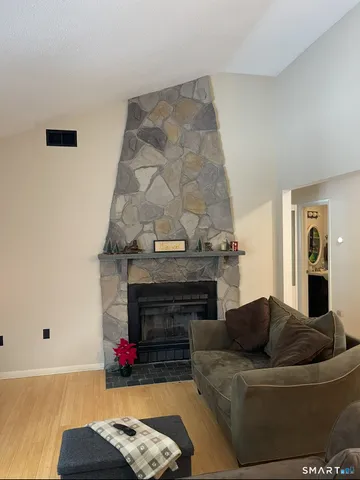 a bedroom with a bed and a ceiling fan