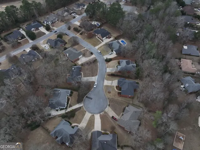 a view of swimming pool with a yard