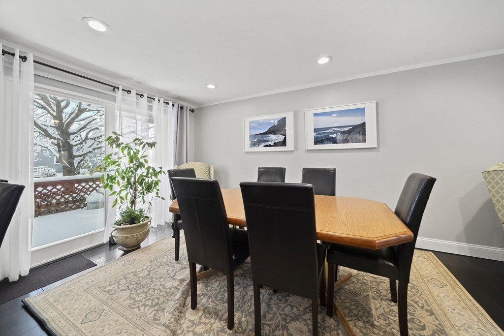4 F Franklin Square, Unit 4F Randolph, MA 02368 - Photo 8 of 26 a view of a dining room with furniture and wooden floor