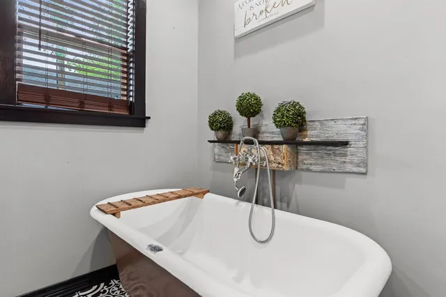 a vase of flowers sitting on a table