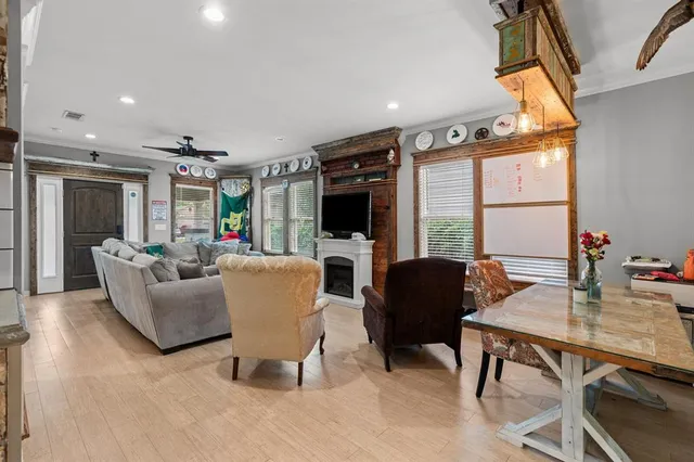 a living room with furniture and a window