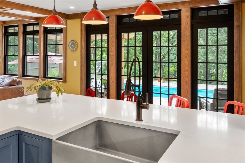 76 Cliff Road Milton, MA 02186 - Photo 14 of 36 a kitchen with a sink and a large window