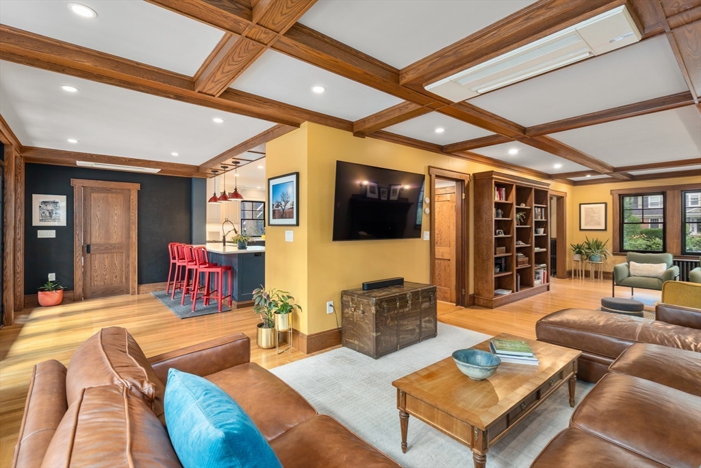 76 Cliff Road Milton, MA 02186 - Photo 17 of 36 a living room with furniture and a flat screen tv