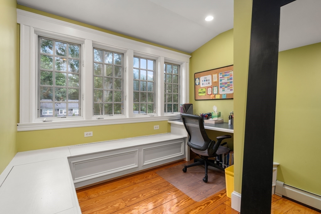 76 Cliff Road Milton, MA 02186 - Photo 25 of 36 a swimming pool with outdoor seating and yard