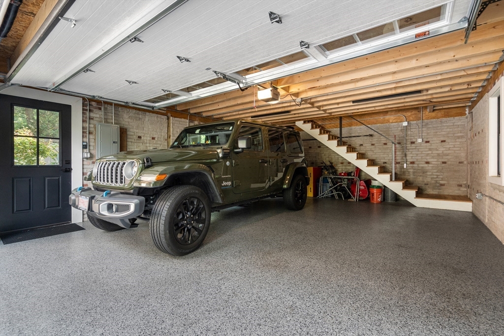 76 Cliff Road Milton, MA 02186 - Photo 33 of 36 a car parked in garage