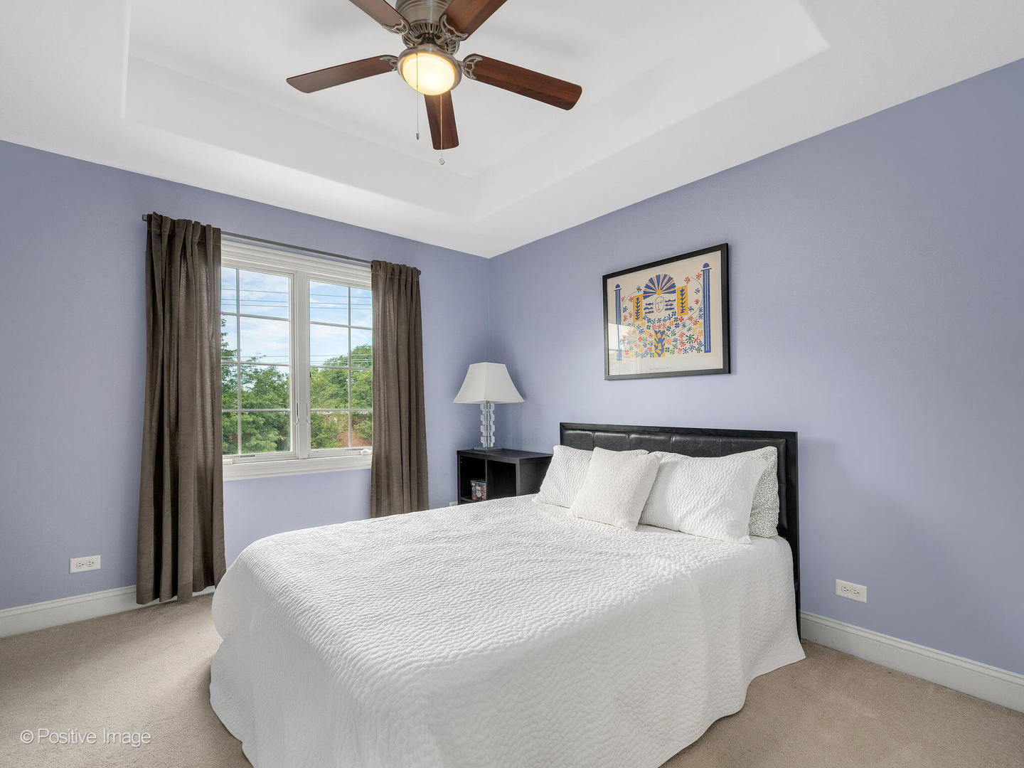 4313 Eberly Avenue Brookfield, IL 60513 - Photo 17 of 22 a bedroom with a large bed and a large window