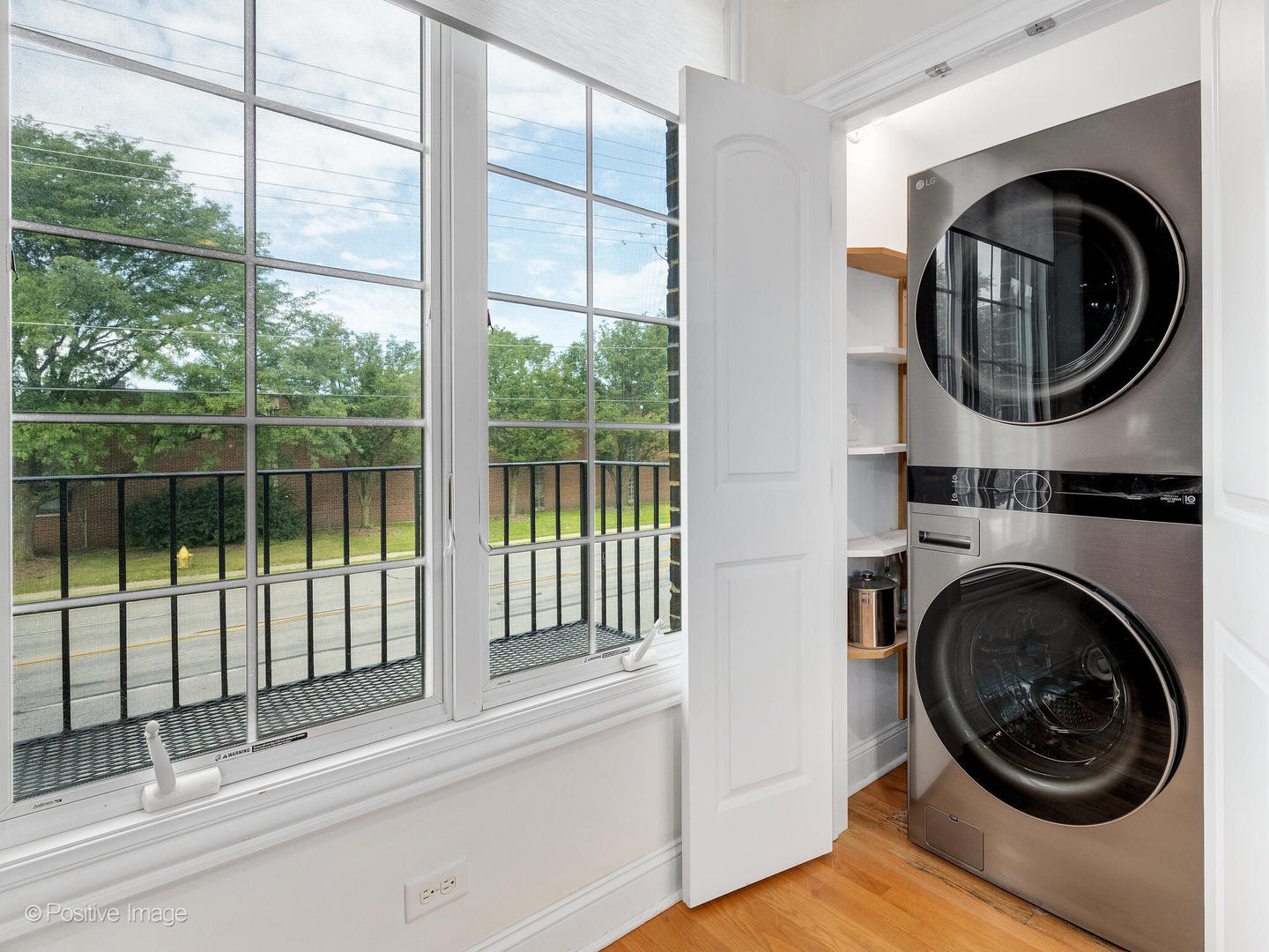4313 Eberly Avenue Brookfield, IL 60513 - Photo 20 of 22 a view of a bedroom with washer and dryer