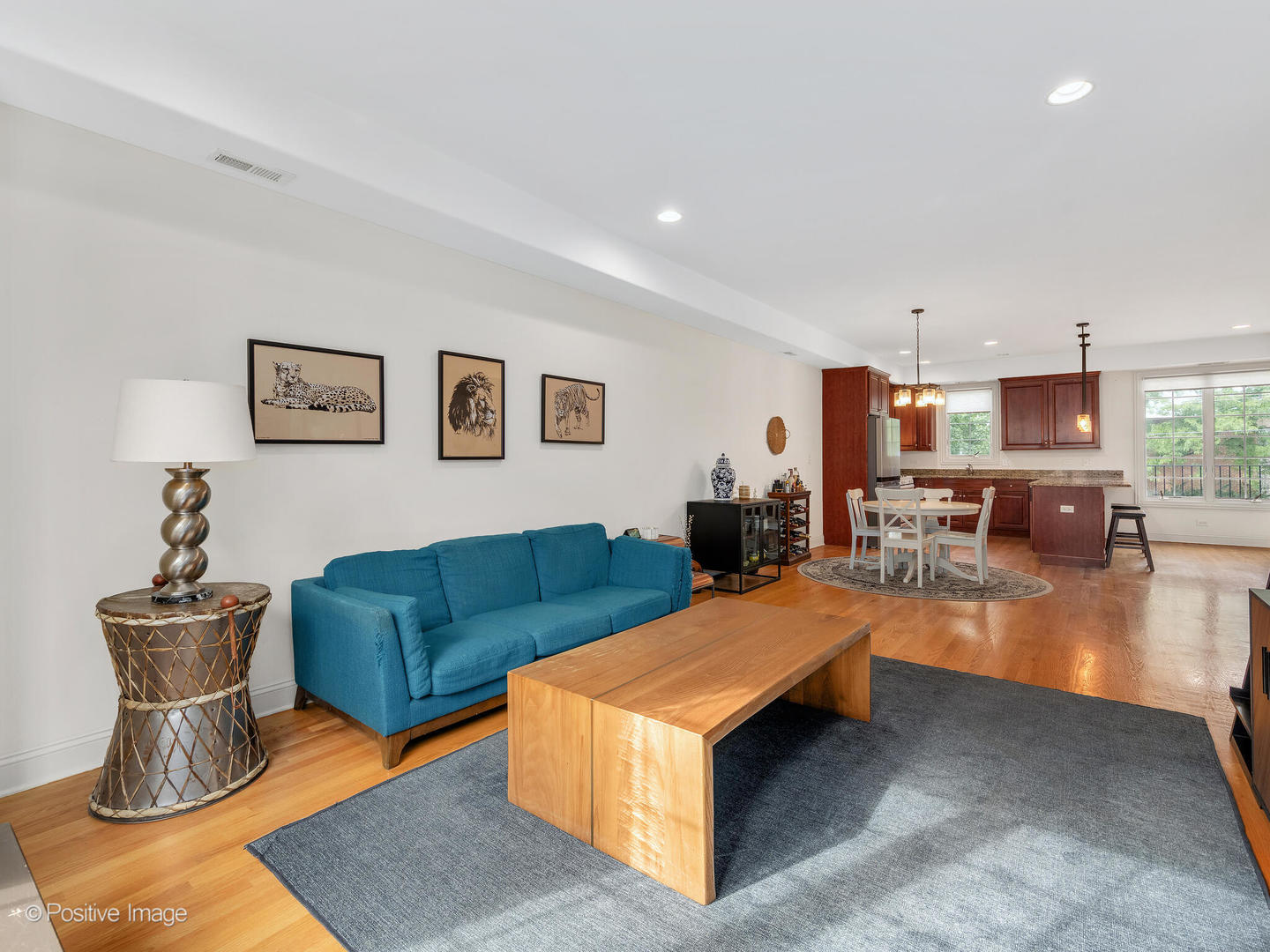 4313 Eberly Avenue Brookfield, IL 60513 - Photo 6 of 22 a living room with furniture and a view of kitchen