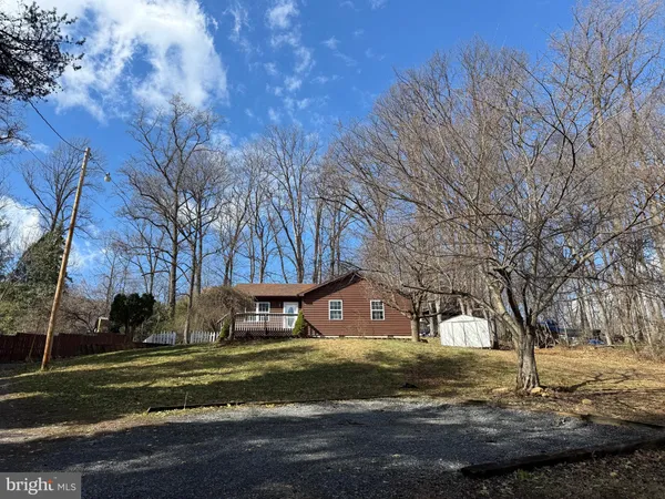 a building with trees in the background