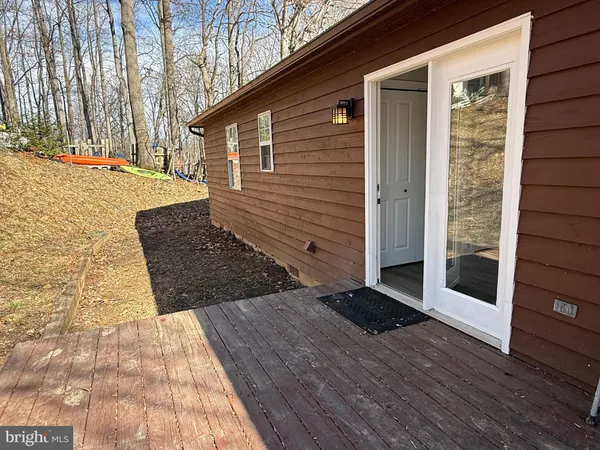 a view of a backyard of the house