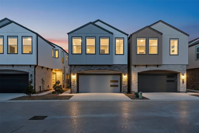 a front view of a house with yard
