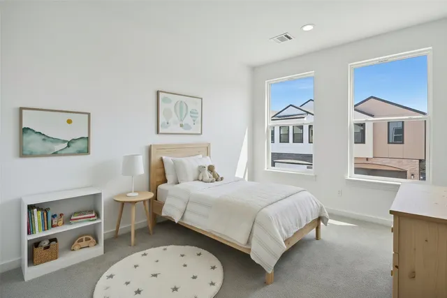 a front view of a house with yard