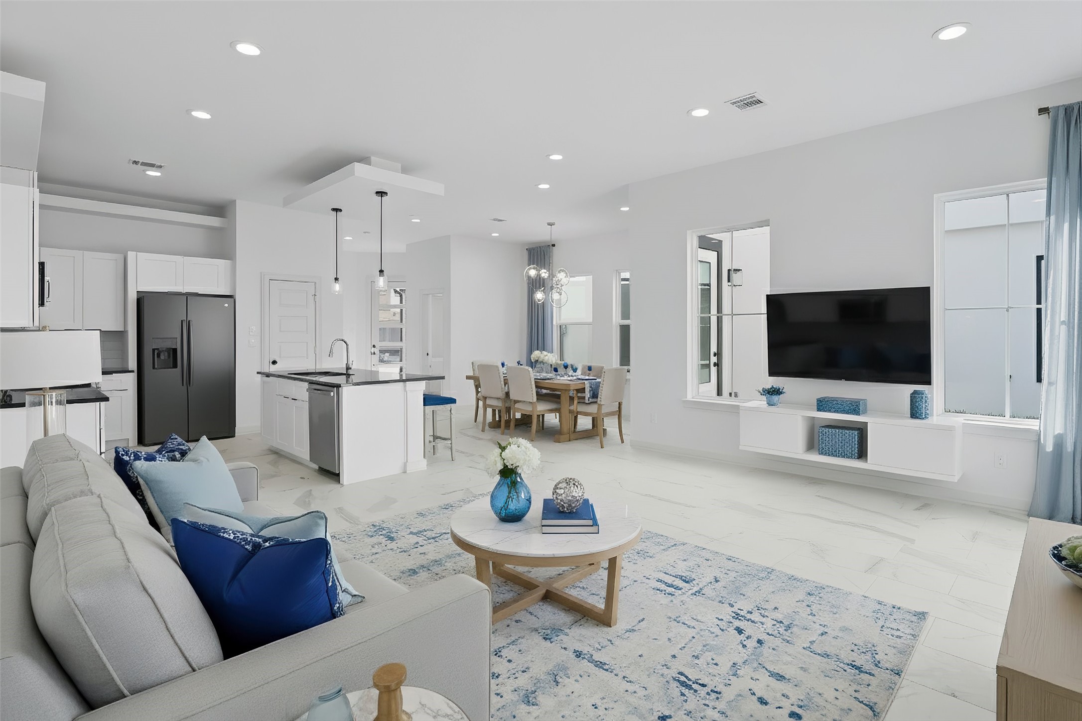 2924 El Fenice Lane Houston, TX 77057 - Photo 7 of 39 a living room with furniture and a flat screen tv