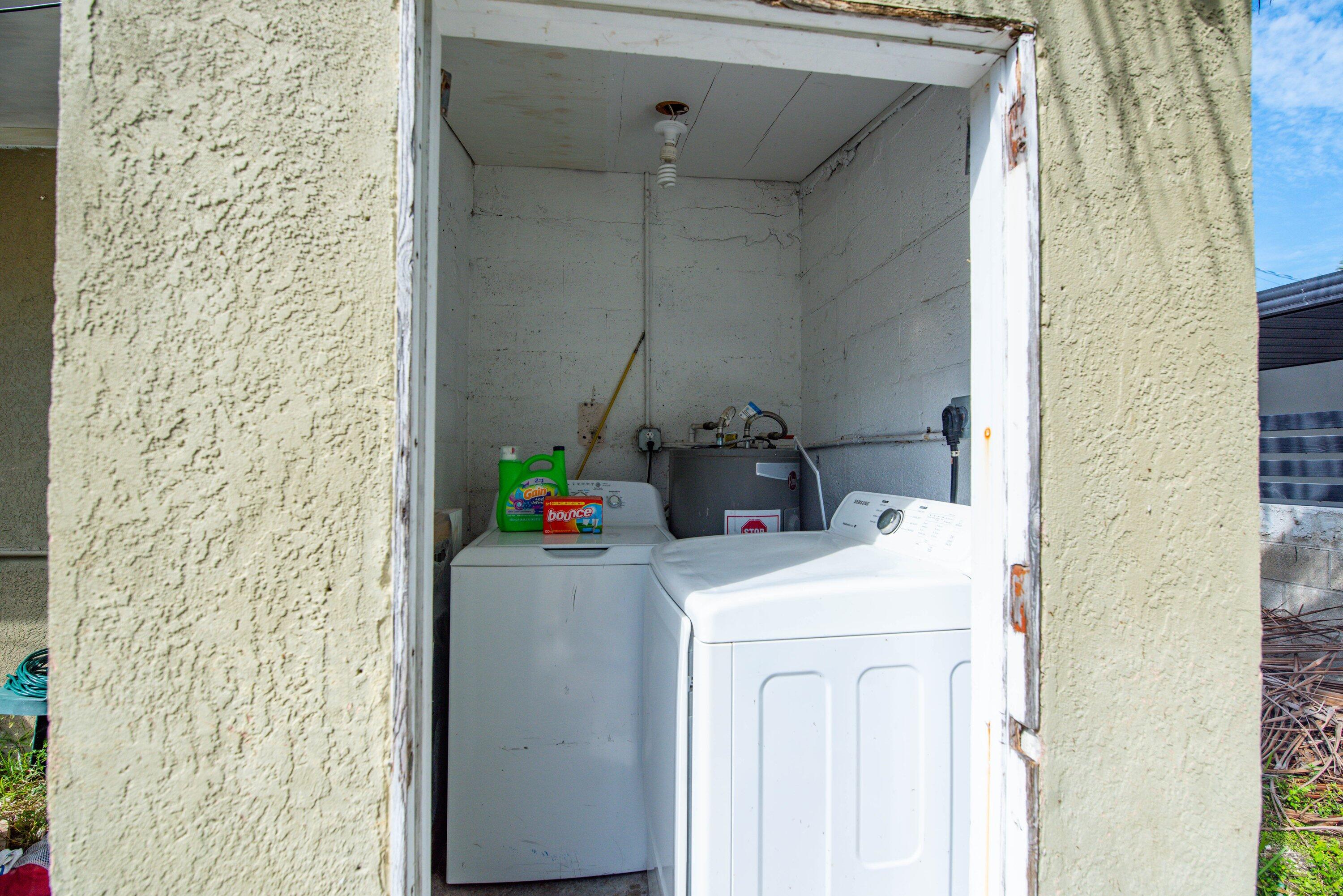 1704 Duncan Street Key West, FL 33040 - Photo 15 of 20 a utility room with dryer and washer