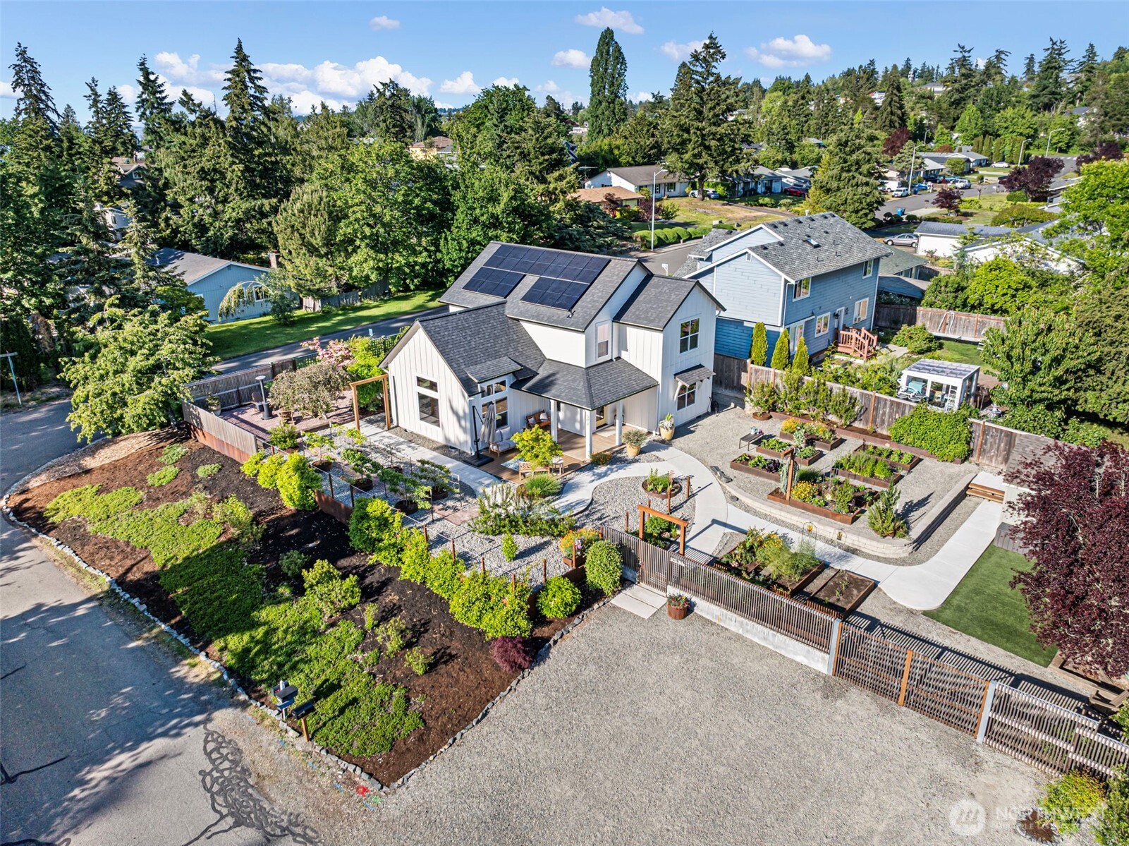 503 5th Street Steilacoom, WA 98388 - Photo 38 of 40 an aerial view of multiple houses with a yard