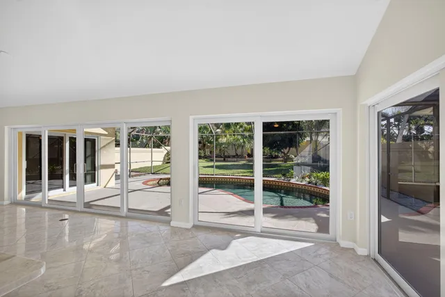 hallway with glass door and glass door
