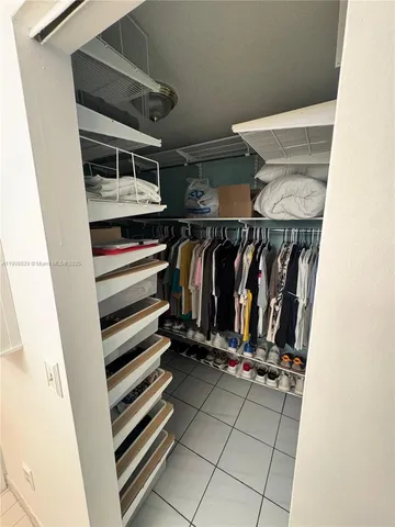 a bathroom with a bathtub and a sink