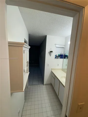 a bathroom with a bathtub sink and toilet