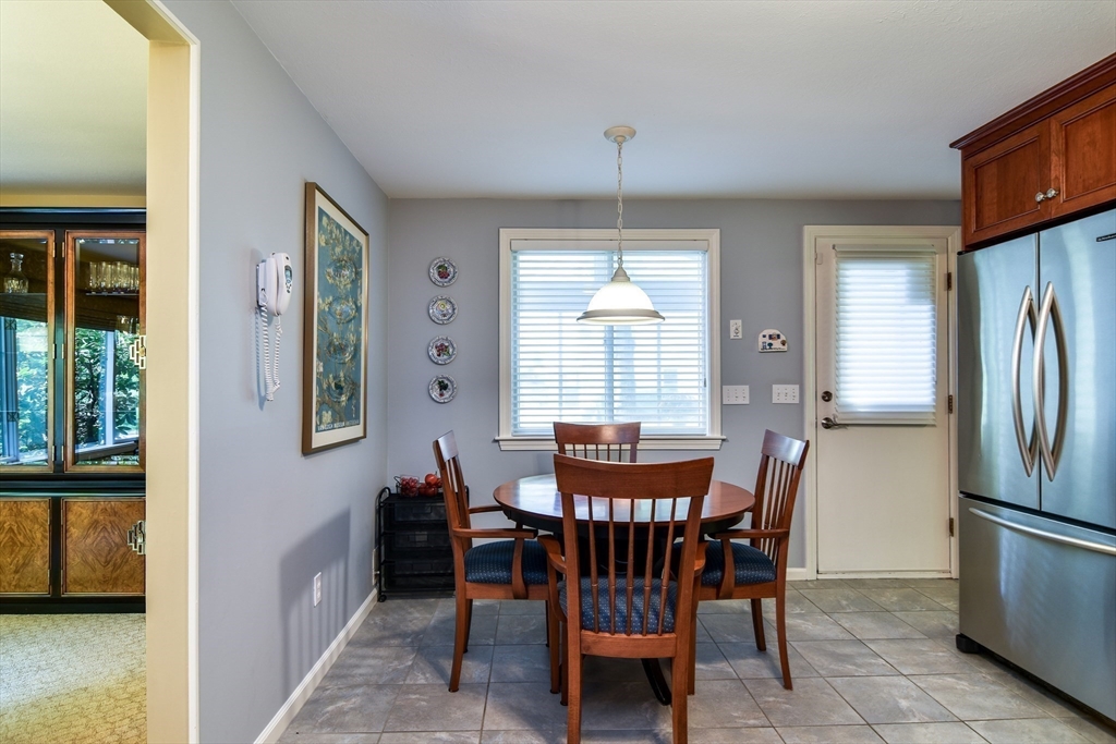 38 Stagecoach Drive Ashland, MA 01721 - Photo 11 of 29 a dining room with furniture and window