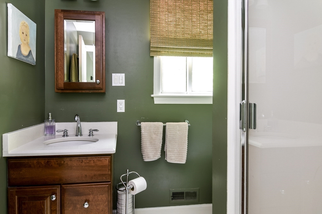 38 Stagecoach Drive Ashland, MA 01721 - Photo 26 of 29 a bathroom with a sink and a mirror