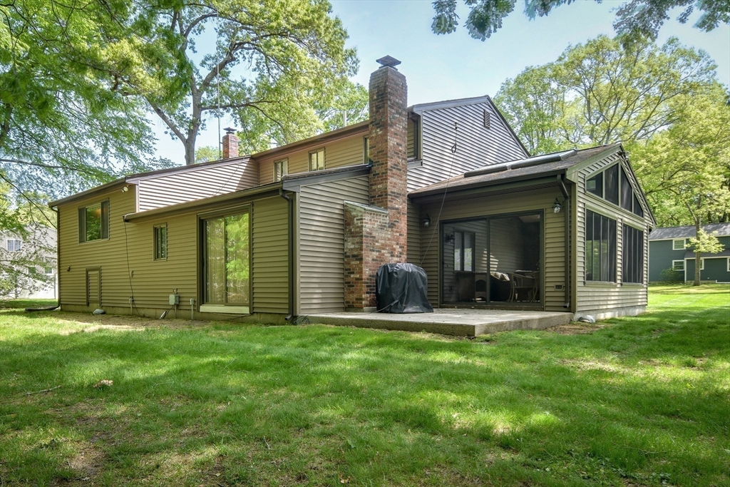 38 Stagecoach Drive Ashland, MA 01721 - Photo 29 of 29 a view of a house with a yard and sitting area