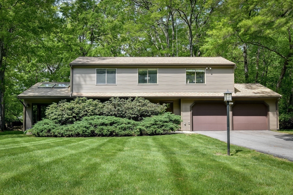 38 Stagecoach Drive Ashland, MA 01721 - Photo 4 of 29 a view of a house with a backyard